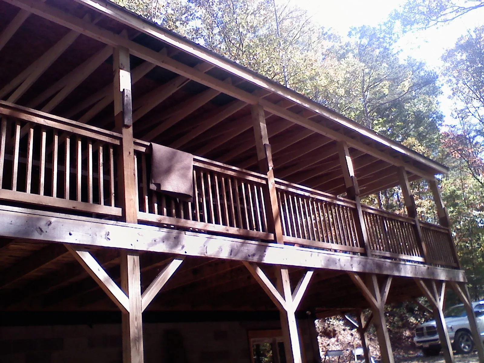 Timber framing under a new elevated porch and deck — Roof Leak Repair in Burnettsville by Roofing Brothers